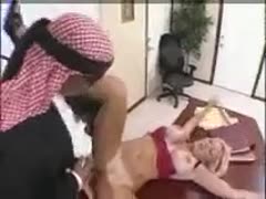In his office, the Arab boss copulates out his blond, breasty assistant.